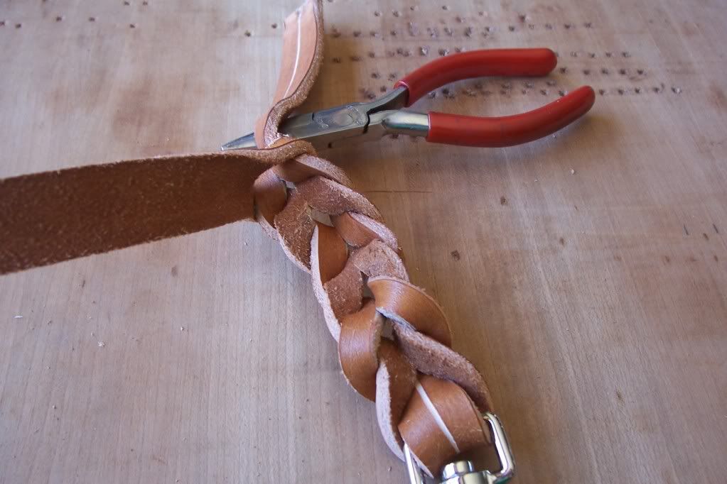A picture tutorial of homemade leather leashes with braided ends